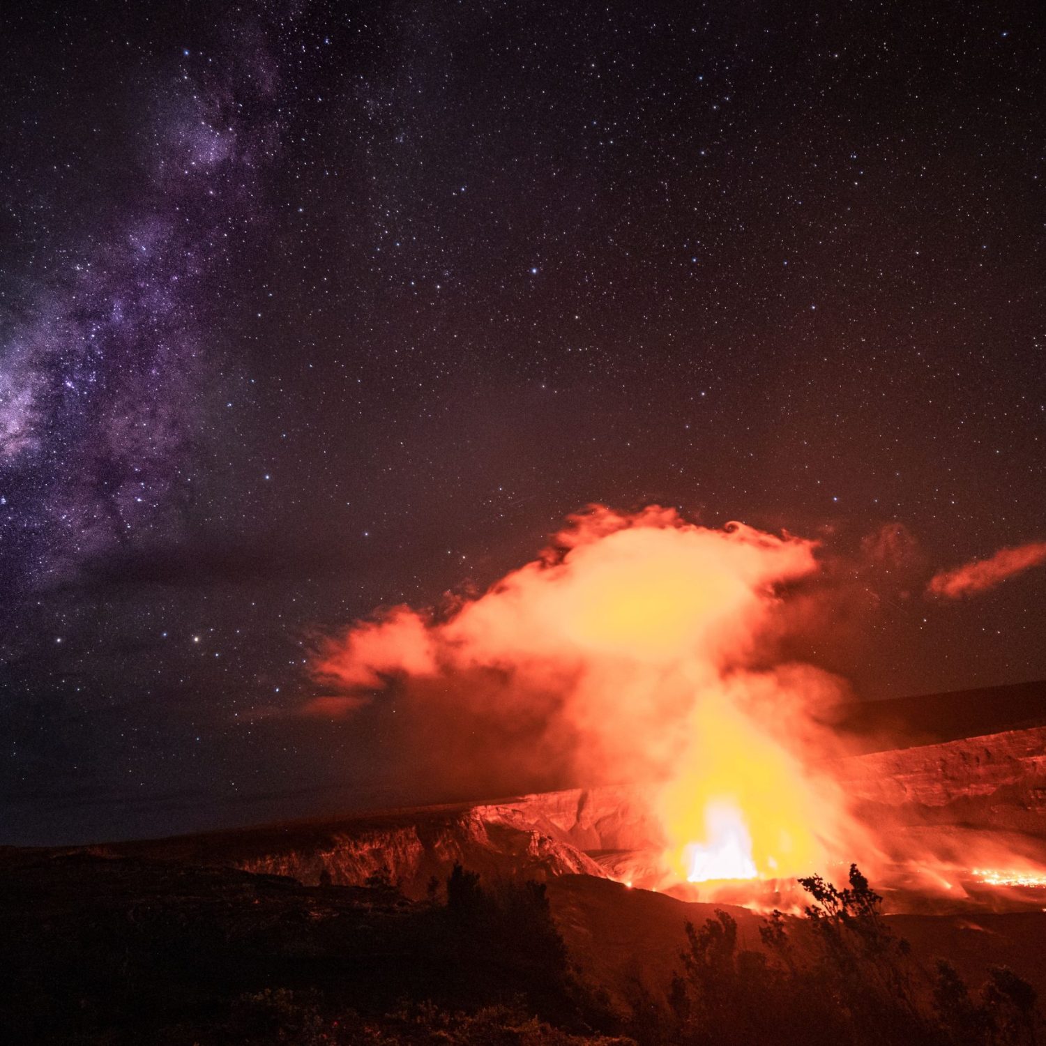 Scenic View Of A Steaming Kilauea Volcano Under A Beautiful Starry Night Sky On Big Island, Hawaii